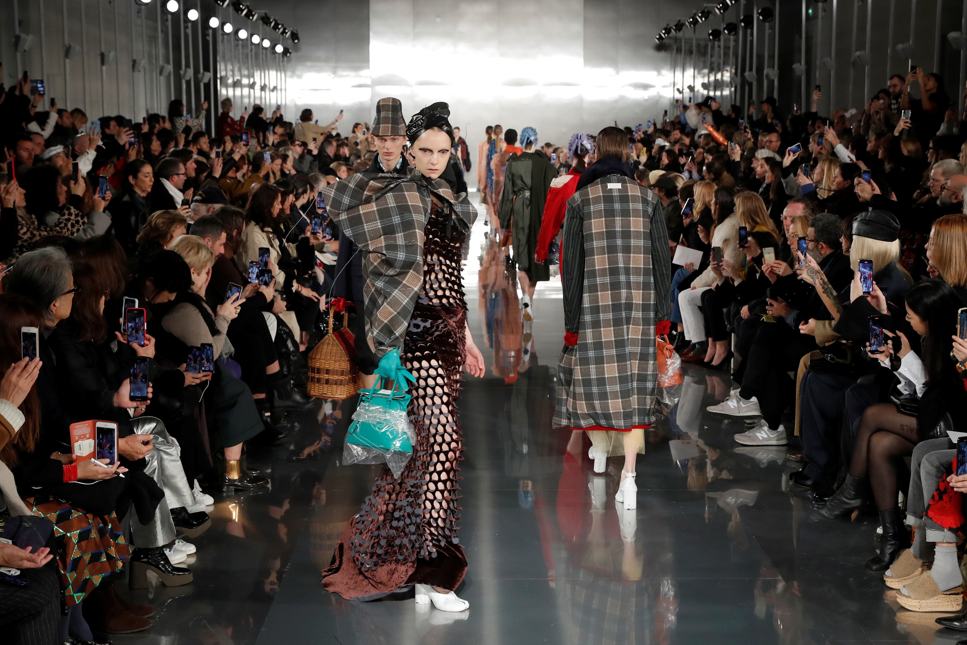 Models present creations by designer John Galliano as part of his Fall/Winter 2020/21 women's ready-to-wear collection show for Maison Margiela during Paris Fashion Week in Paris, France February 26, 2020. REUTERS/Gonzalo Fuentes
