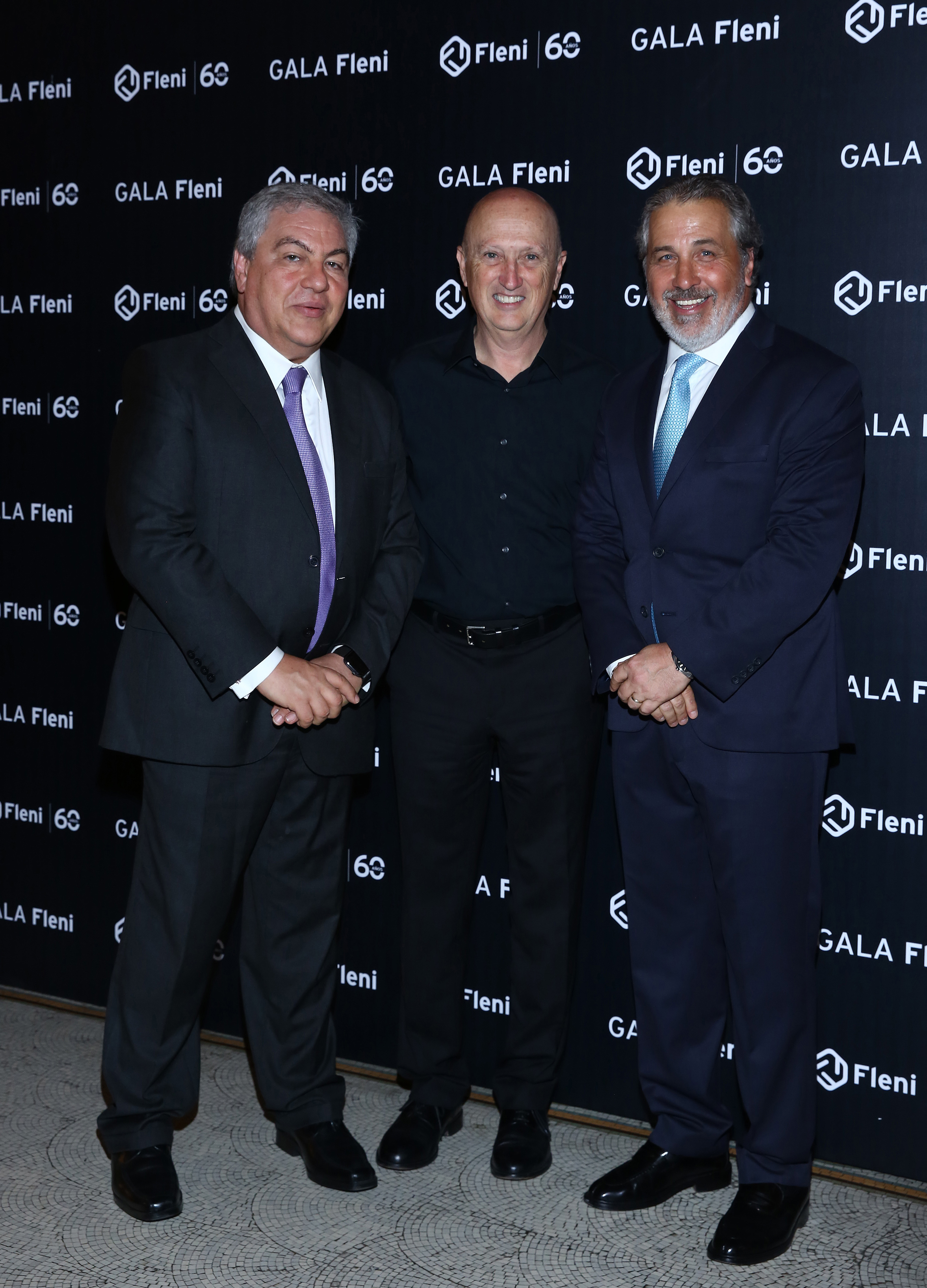 Gustavo Sevlever (director de Investigación y Docencia de Fleni), Fernando Kiguel (director de la Orquesta Ensamble 21) y Fernando Carcavallo (presidente de Fleni)