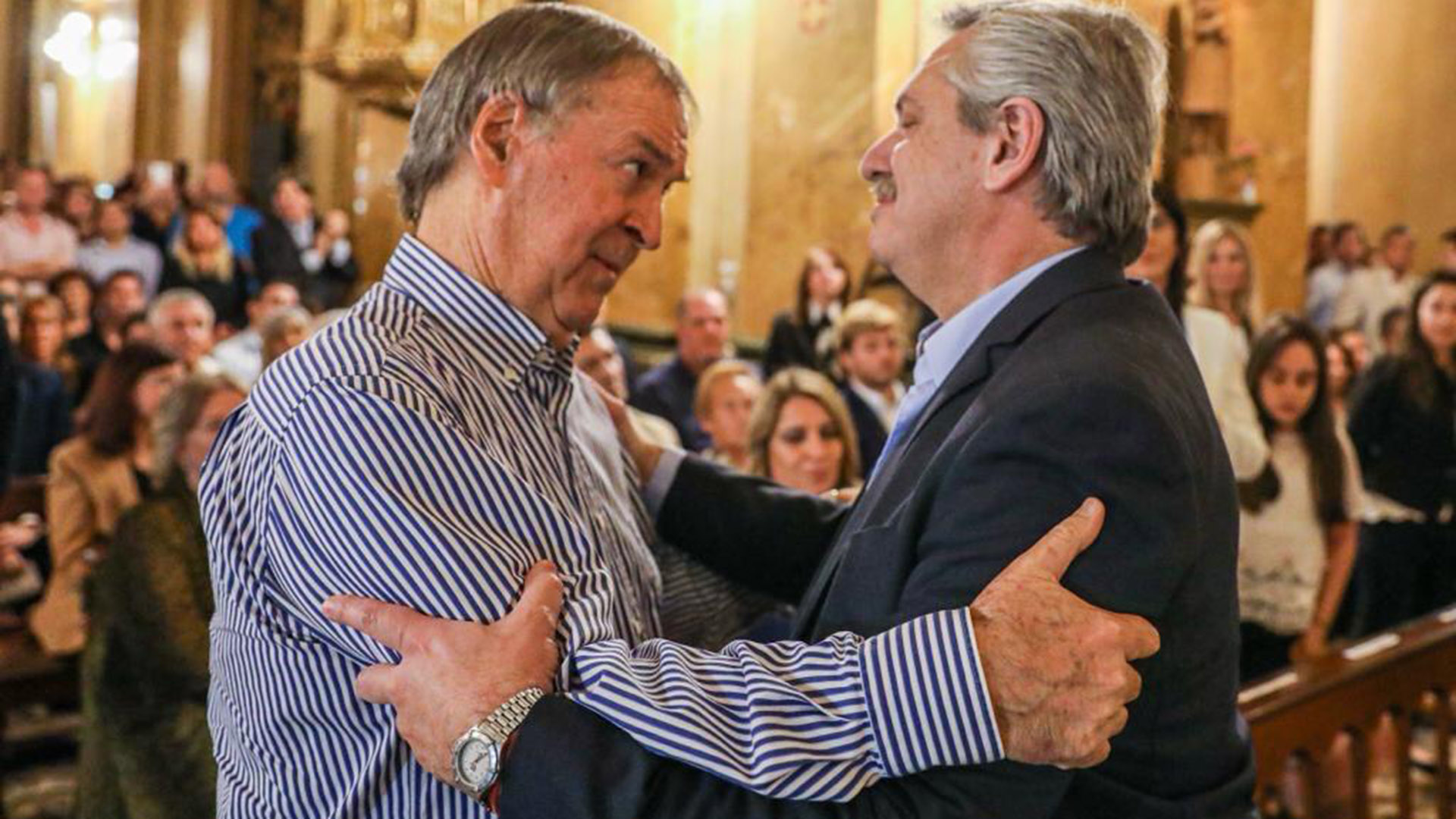 Juan Schiaretti y Alberto Fernández en la misa