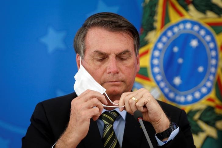 Resultado de imagem para “¡Antipatriota, infame!”: El enojo de Jair Bolsonaro con una periodista por una pregunta sobre su gestión frente al coronavirus