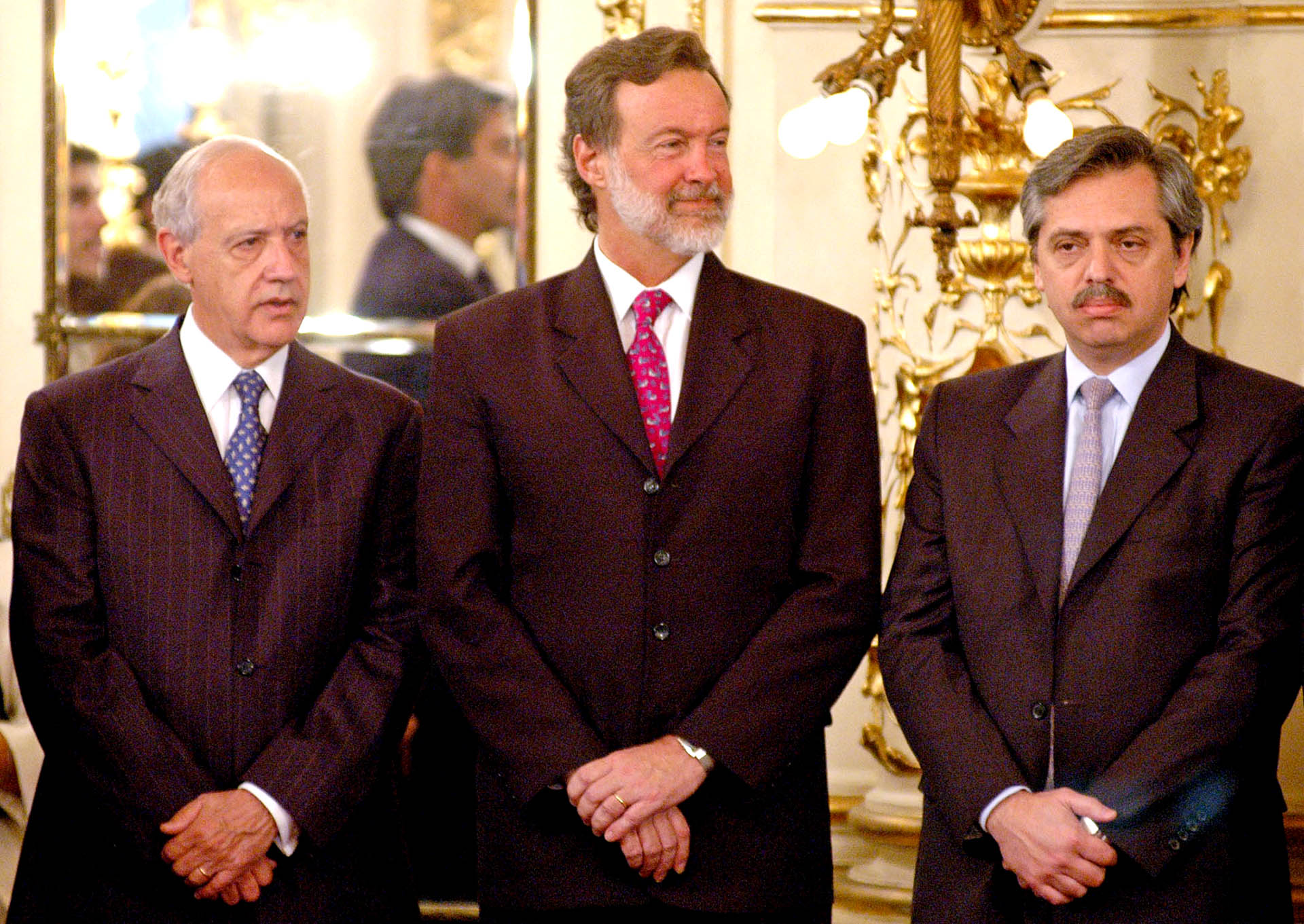 Compartió gabinete con Roberto Lavagana, quien estuvo al frente del Ministerio de Economía y Producción durante los dos primeros años de la presidencia de Néstor Kirchner, hasta su renuncia en noviembre de 2005. No tuvo una relación particularmente buena entonces. En la foto, también Rafael Bielsa, por entonces canciller.
