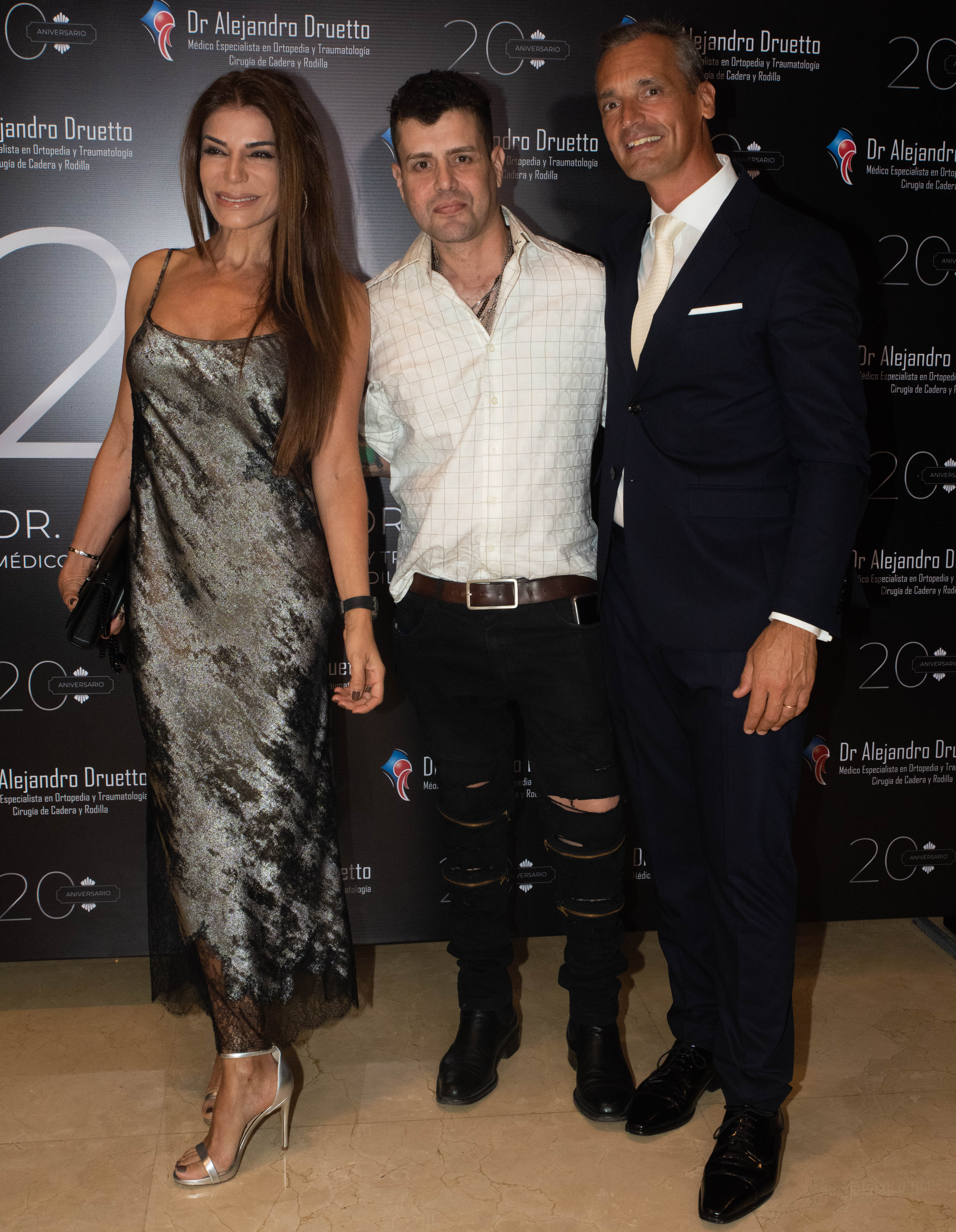 Zulemita y Carlos Nair Menem, con el doctor Druetto