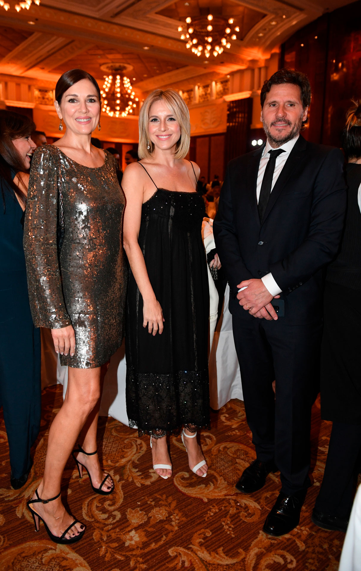 Andrea Frigerio, Carla Peterson y Lucas Bocchino