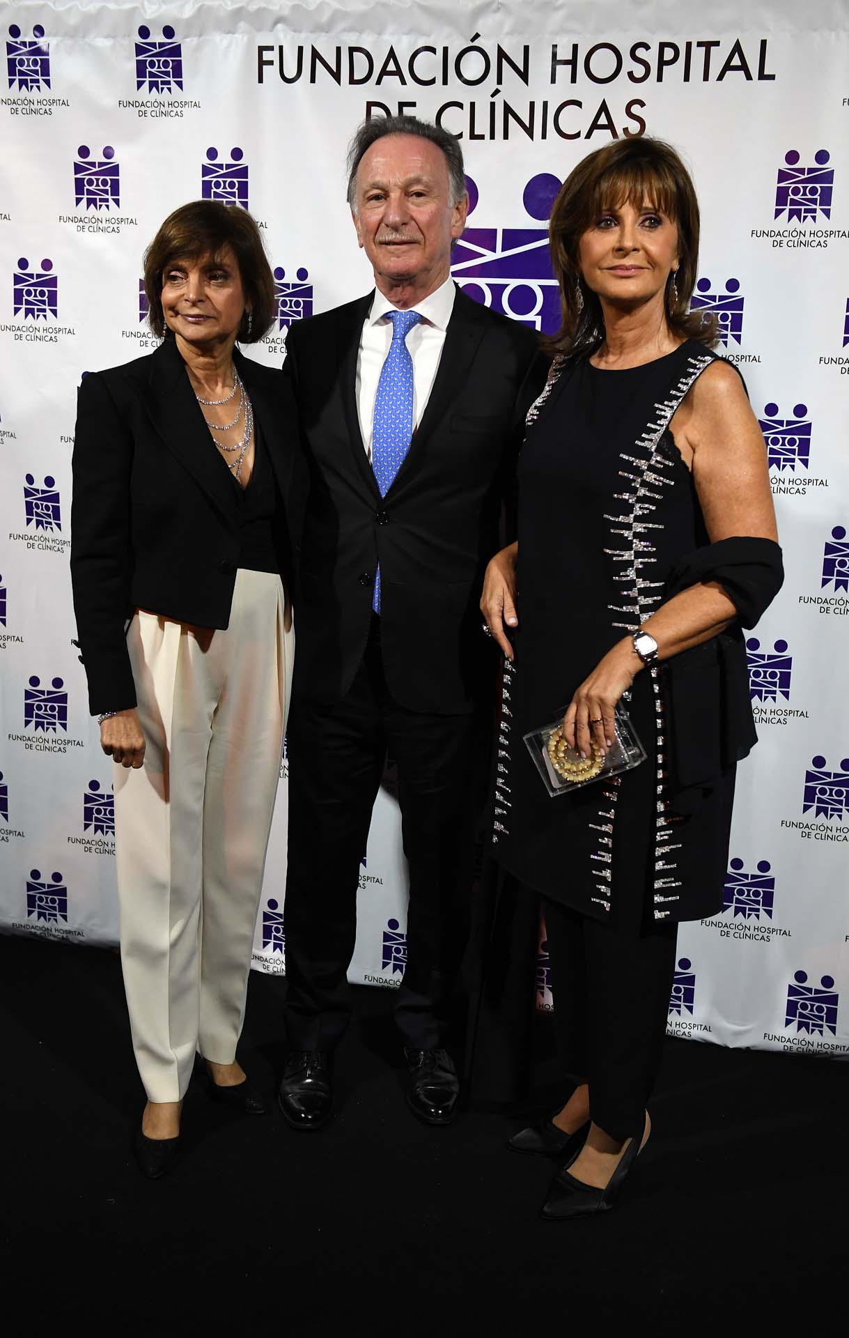 Claudia Stad junto a Gustavo Weiss y su mujer Myriam Levi