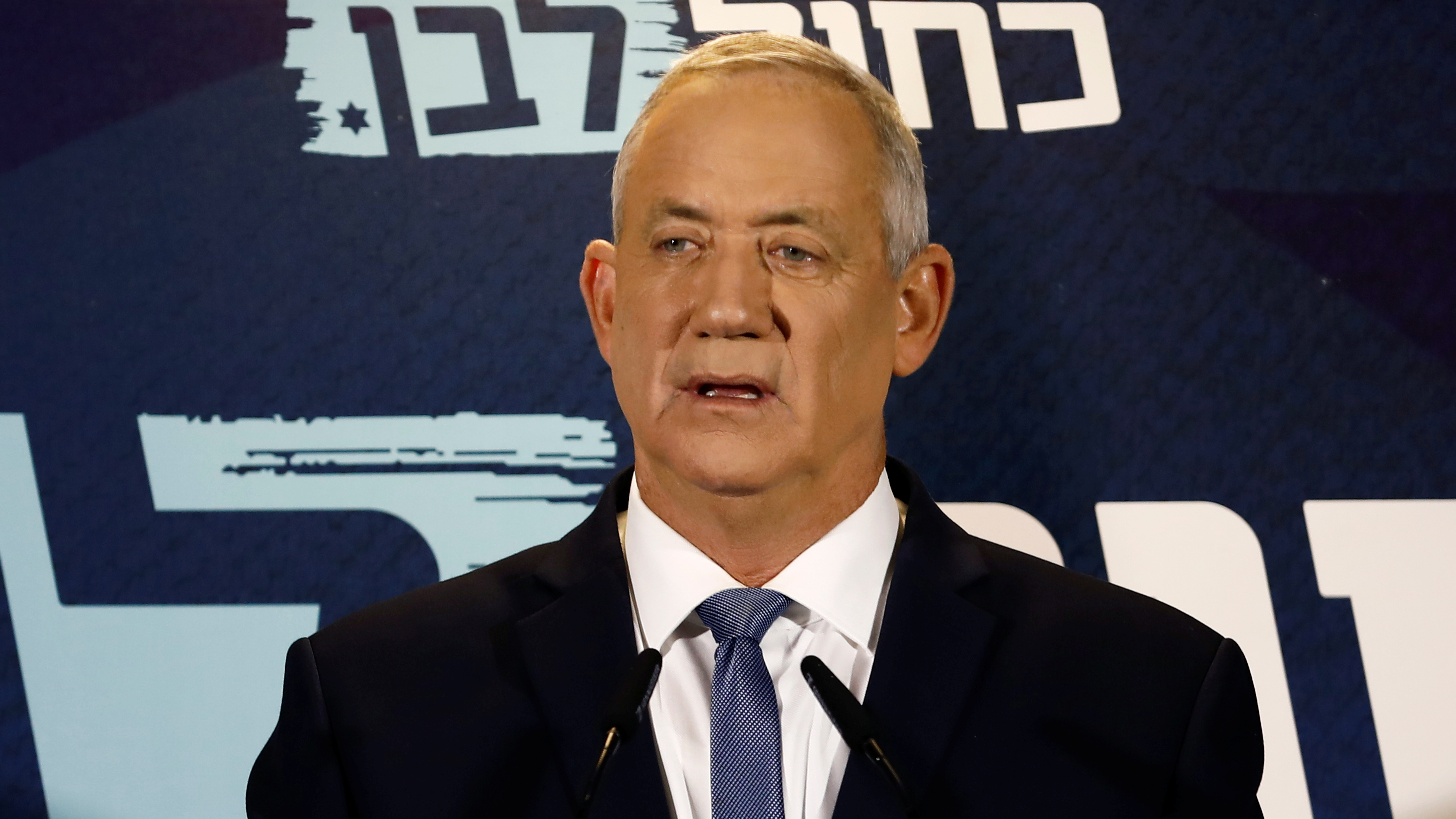 Benny Gantz, leader of Blue and White party, delivers a statement at the start of his party faction meeting in Tel Aviv, Israel September 26, 2019. REUTERS/Corinna Kern