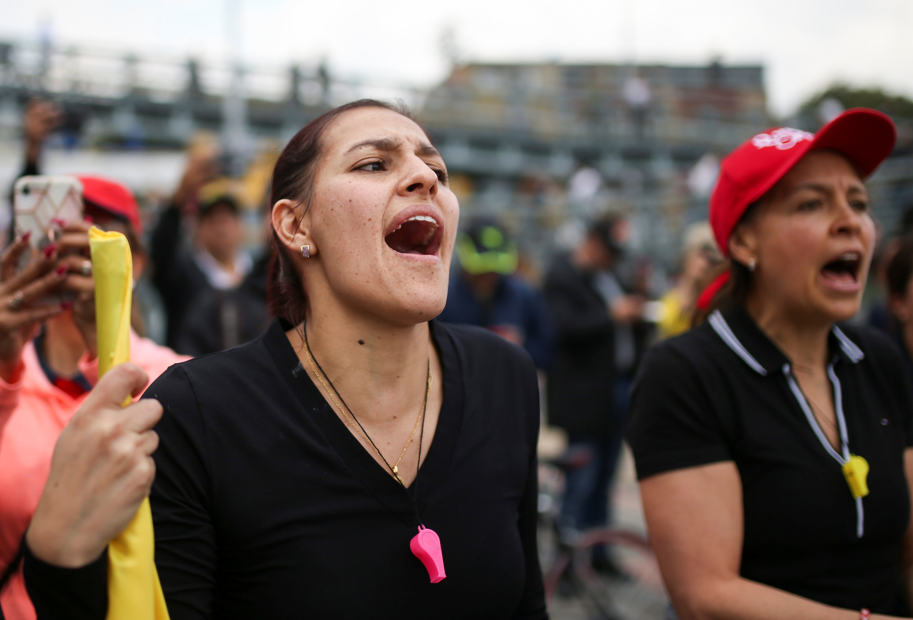 Demonstrators shout slogans as they participate in a protest for a national strike, in Bogota, Colombia, November 21, 2019. REUTERS/Luisa Gonzalez